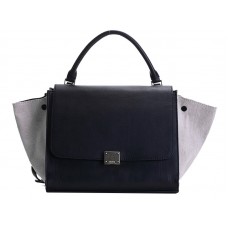 Celine Trapeze schoudertas van kalfsleer in zwart/crème canvas