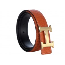 Hermes Togo leren riem met gouden H-gesp in baksteenkleur.