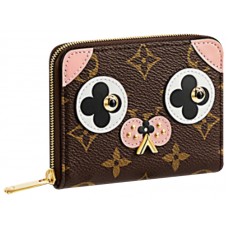 Louis Vuitton Monogram Canvas Zippy portemonneetje en een schattige hond
